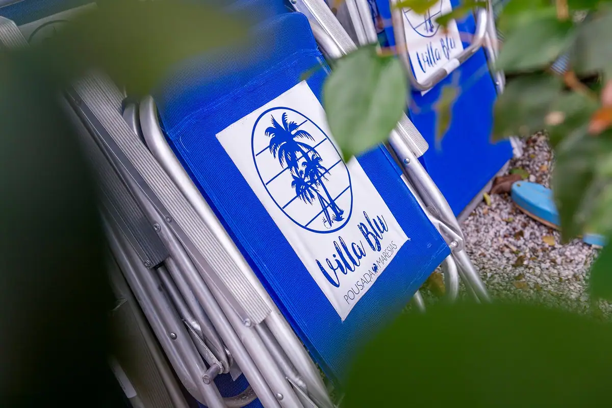 Beach chairs with the Villa Blu logo
