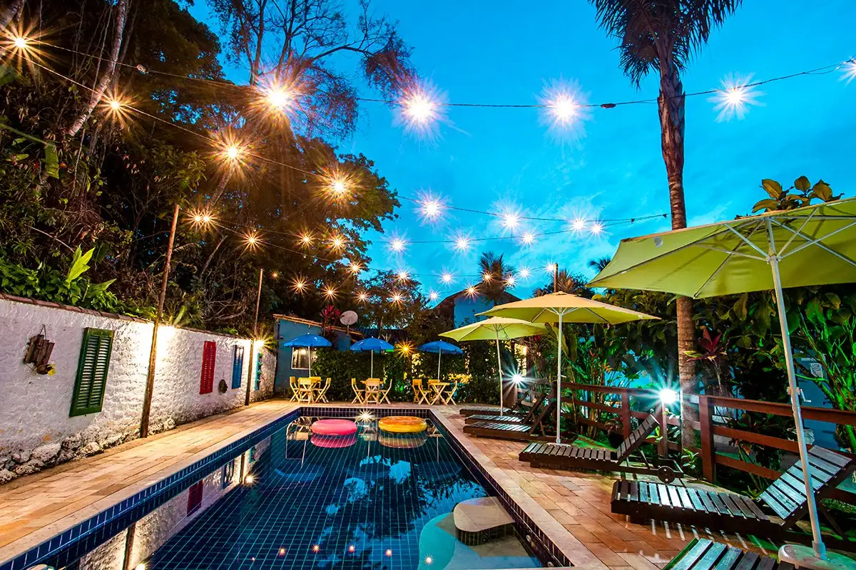 The inn's heated pool at dusk, with string lights on