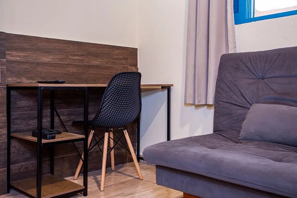 Desk, chair and sofa in the Deluxe Suite
