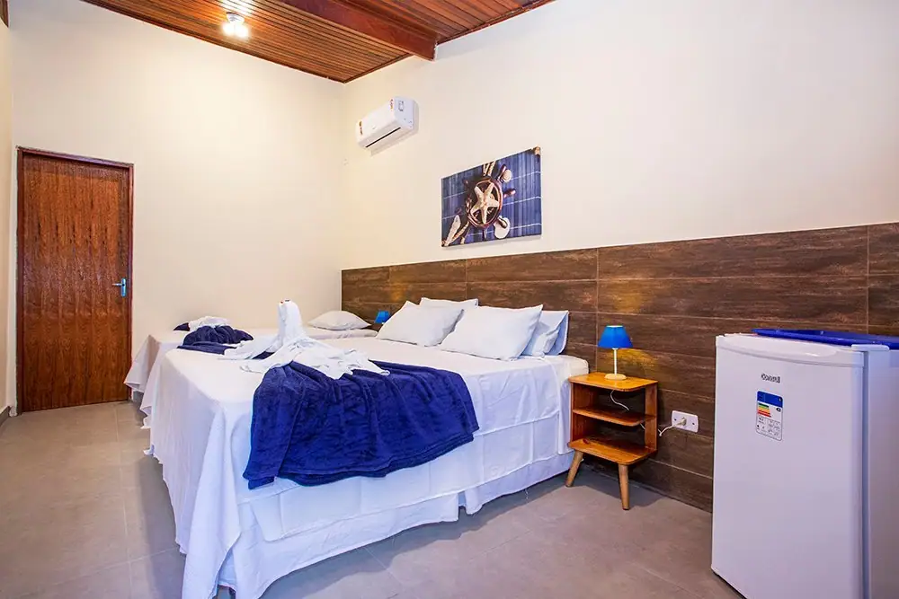 Standard Suite at Pousada Villa Blu in Maresias, with a king bed and minibar